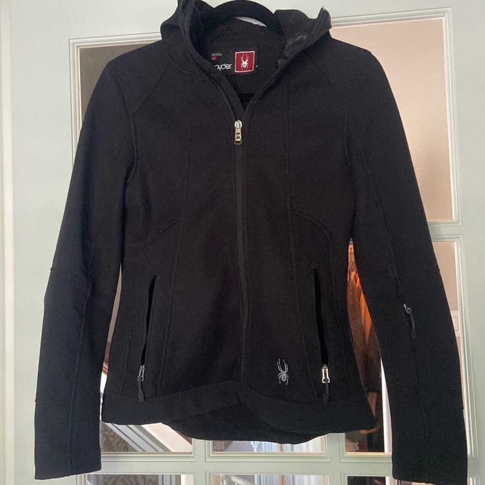 Spyder black ribbed hooded jacket. Zipper pockets & sleeve. Barely worn.